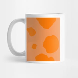 Cow Spots in Orange Mug